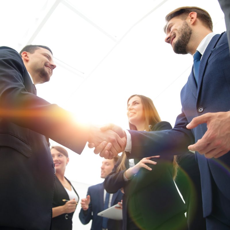 Business people shaking hands in an office