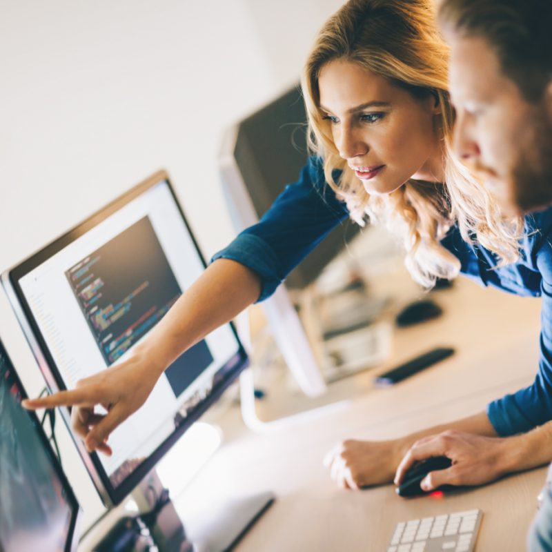 Programmer working in a software developing company office